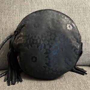 Vintage black leather embossed circular bag